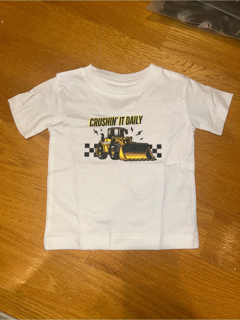 Kids 'Crushin' It Daily' White T-Shirt with Yellow Bulldozer Graphic